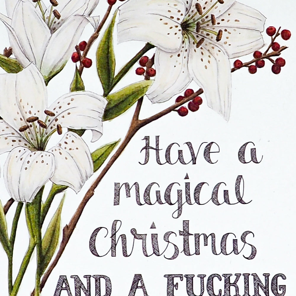 close up of card that says Have a Magical Christmas and a Fucking Stupendous New Year Card