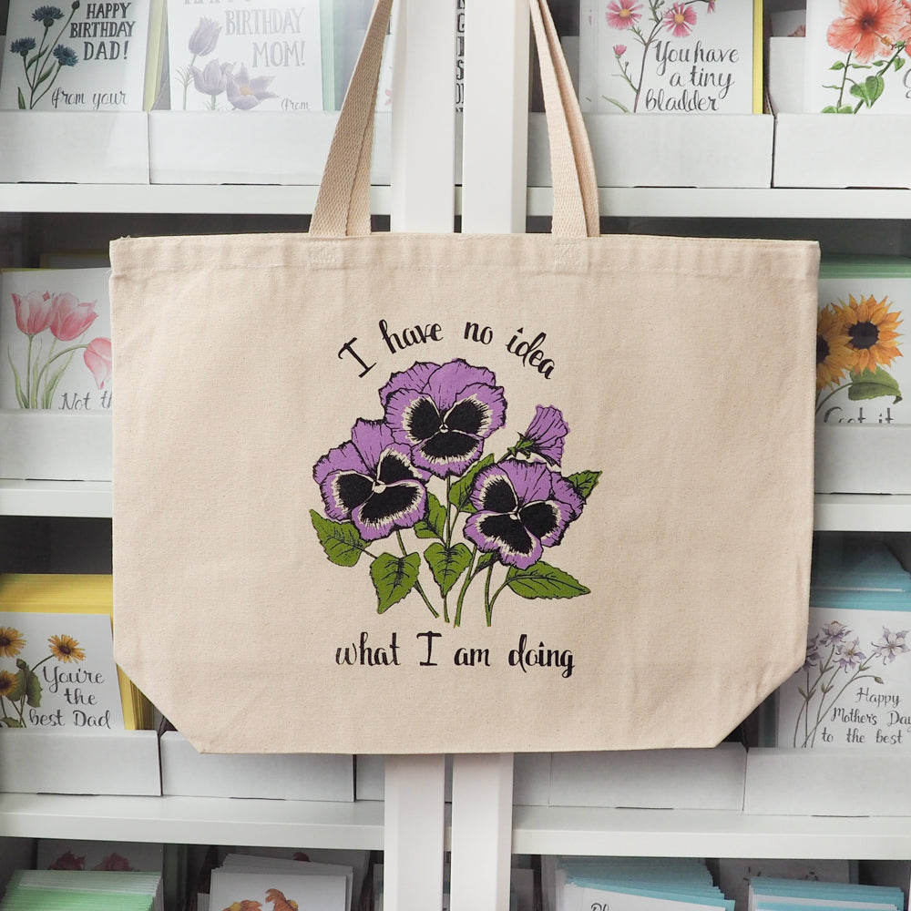 I have no idea what I am doing tote bag hanging up